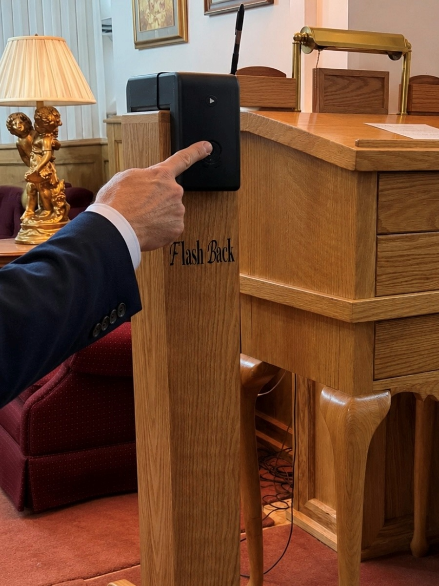 Flashback on stand at funeral service